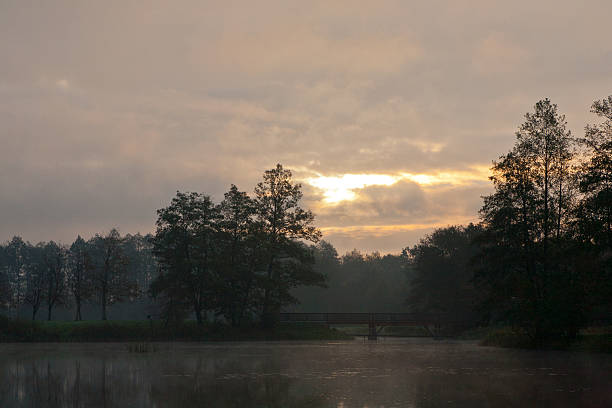 istock Sunrise over peaceful pond of Palace Park 526111461