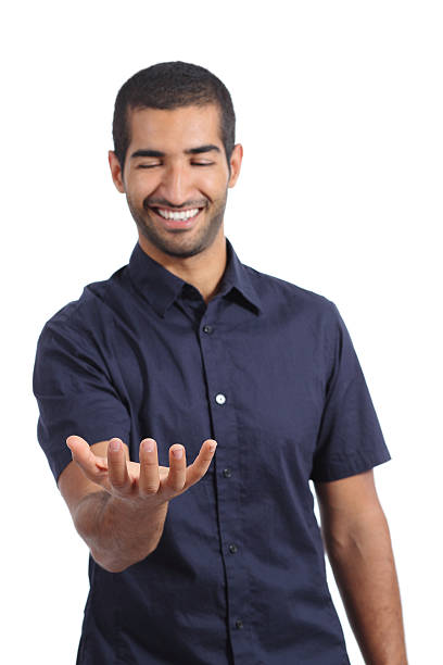 Arab happy man holding something blank in his hand Arab happy man holding something blank in his hand isolated on a white background hand palm stock pictures, royalty-free photos & images