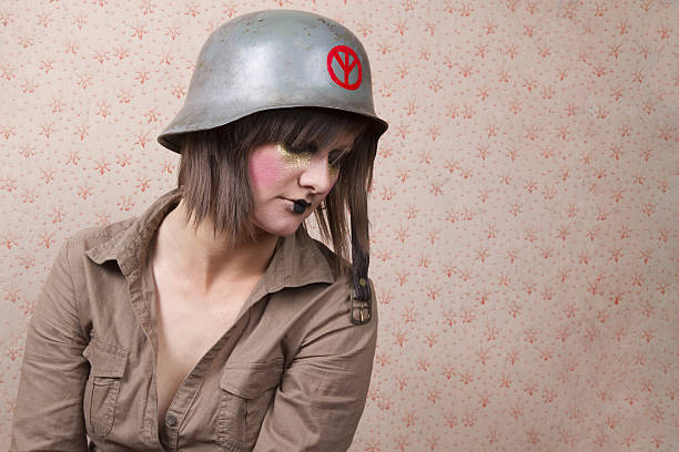 istock woman in army hat and a  creative makeup 526115893