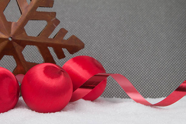 istock Vintage red christmas ornaments on gray background 526116559