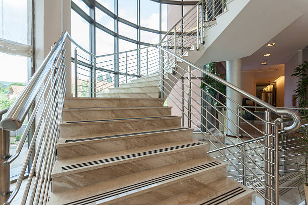 istock Stairs in a bright building interior 526116923