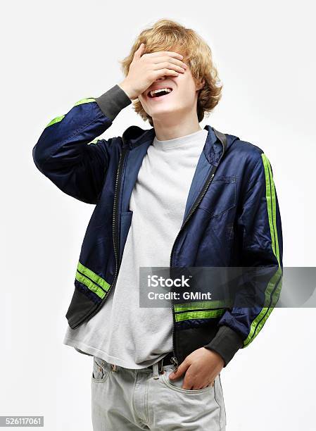 Portrait Of Laughing Teenage Boy Stock Photo - Download Image Now - Adolescence, Adult, Blond Hair