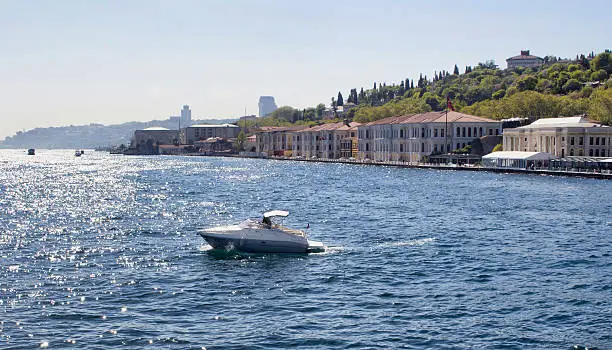 Yacht in front of Galatasaray University on Bosphorus in Istanbul