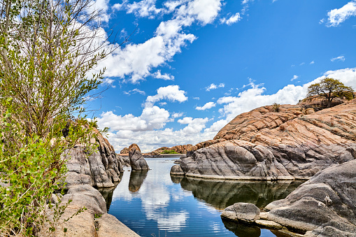professional high resolution landscape photograph of a scenic granite mountain lake showing classic composition and lighting fundamentals and non intrusive post processing techniques