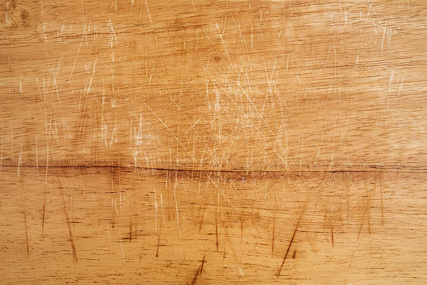 istock Old scratched wooden cutting board texture 526130810