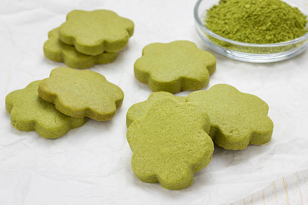 istock Homemade matcha green tea shortbread cookies on parchment 526132544