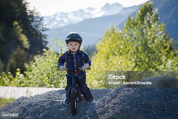 Kid On A Run Bike Stock Photo - Download Image Now - 12-17 Months, Baby Clothing, Beauty In Nature