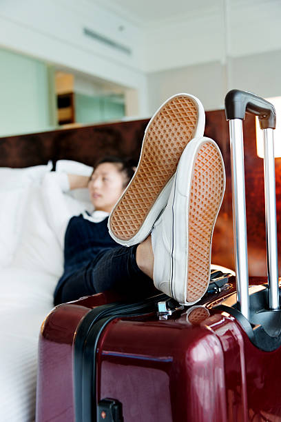 istock Young woman resting at hotel room 526134448