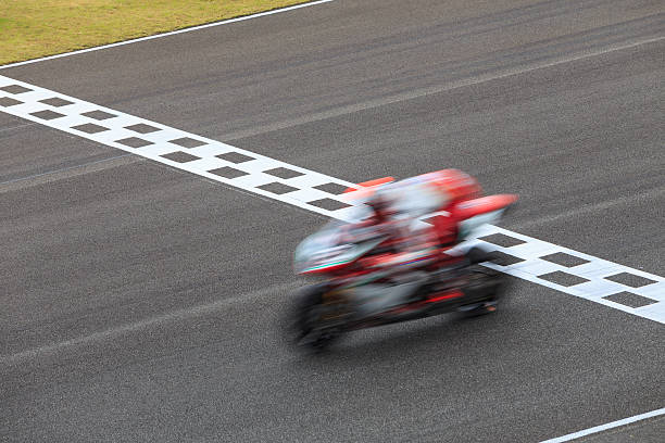 istock Blur Superbike Crossing Checkered Finish Line 526134824