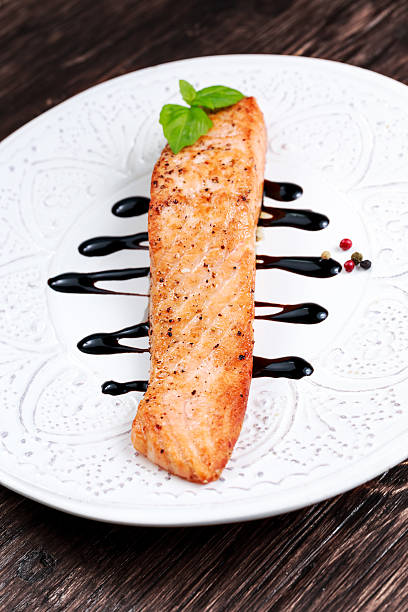 istock Fried salmon fillet served with reduced balsamic vinegar 526134870