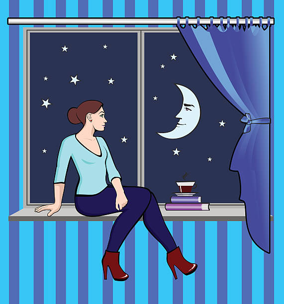 istock The woman sitting at the window on the night sky 526135454