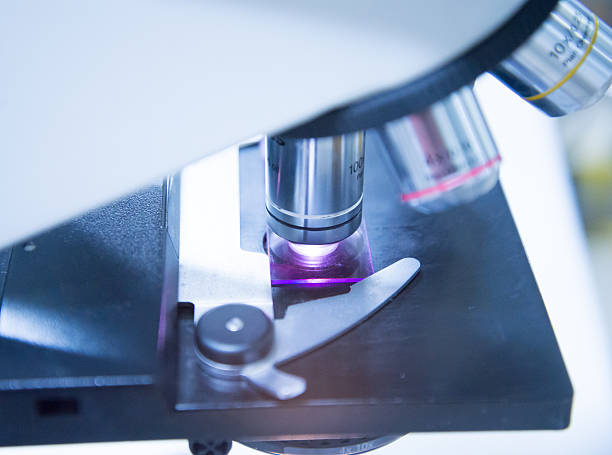 istock Medical equipment. microscope blue tone. 526138870
