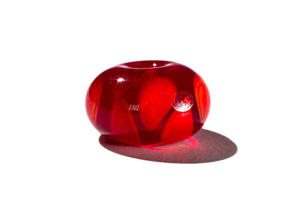 istock Hand made transparent red glass bead 526139442