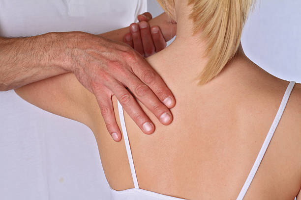 istock Therapist  doing healing treatment  on woman's back . Alternative medicine 526139508