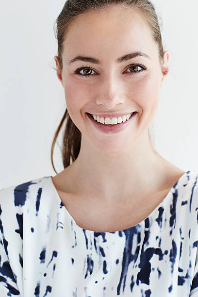 istock Confident young woman looking at camera, smiling 526142642