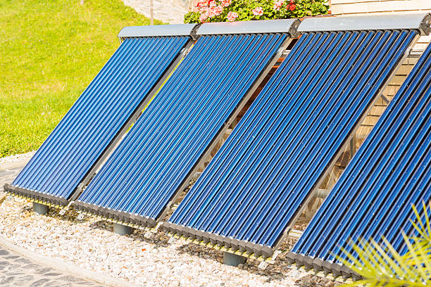 Evacuated tubes solar collector stock photo