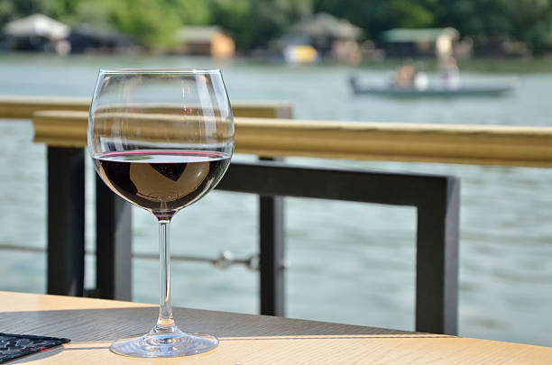 istock Glass of Vine by the River 526147084