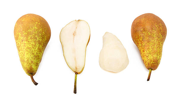 Conferenza pears-intera, dimezzata e Sbucciato - foto stock