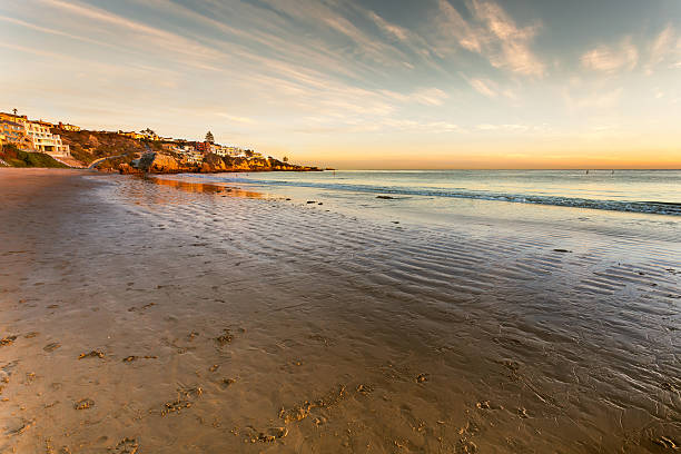 istock Houses on the cliff overlooking pacific ocean at sunset 526149343