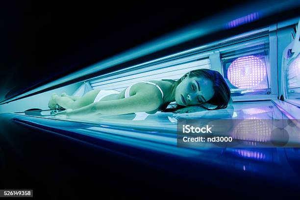 Beautiful Woman Lying In Solarium Stock Photo - Download Image Now - Tanning Bed, Women, Adult