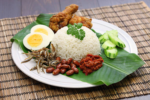 nasi lemak, malaysian cuisine nasi lemak, coconut milk rice, malaysian cuisine cooking nasi lemak stock pictures, royalty-free photos & images