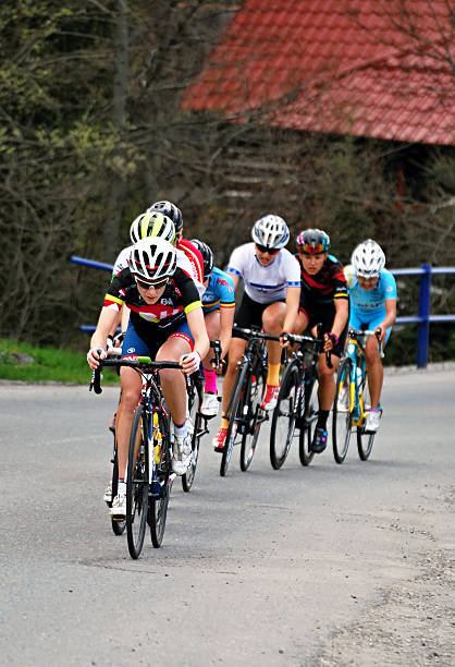 chasing group during women cycling race Krasna, Сzech republic - April 30, 2016: chasing group during 4th stage of Gracia Orlova Women World Cup cycling race during ascent do highest point of race and finish of 4th stage - Visalaje  beskid mountains photos stock pictures, royalty-free photos & images