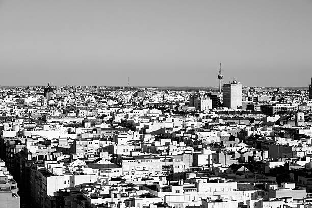 Aerial view of Madrid from the South West on a clear Winter morning, with Torrespaña communications tower and other representative buildings to be recognized in the background. Toned.