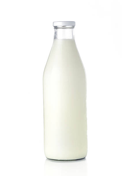 istock Milk Bottle with Metal Lid on White Background 526150382