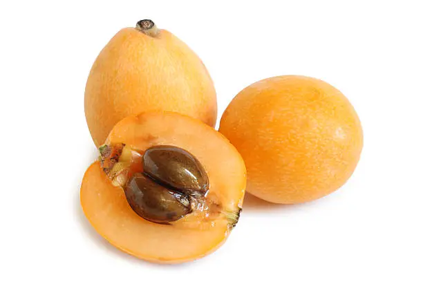 Loquat medlar on white background