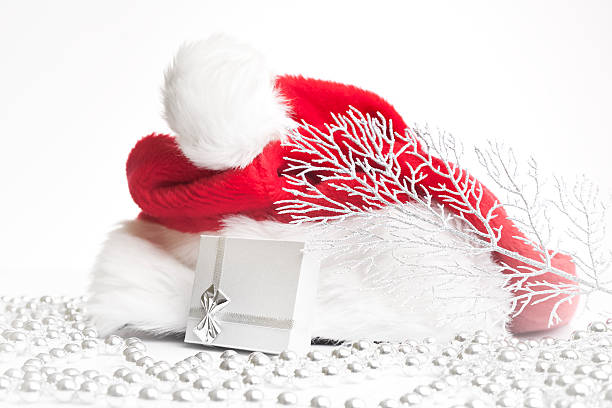 istock christmas background with sanata claus hat and present 526152183