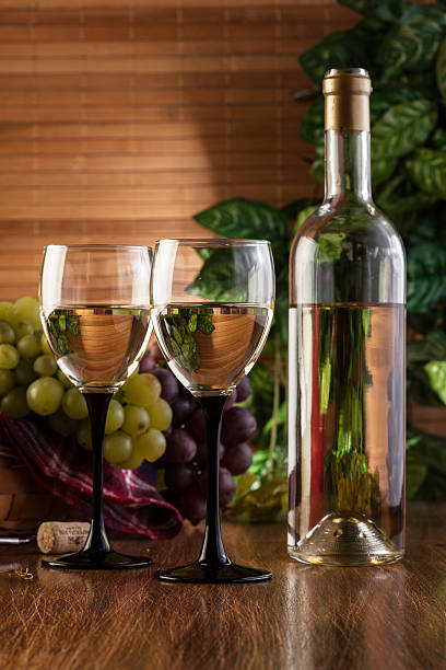 istock Bottle and glasses of white wine 526152195