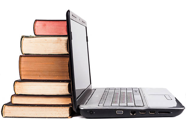 istock Old Books And Laptop 526152748