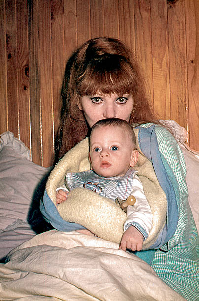 istock New mom with her baby boy 526154142