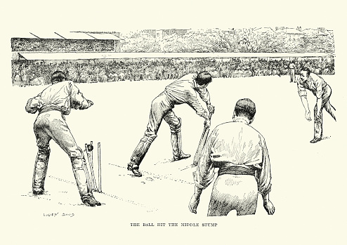 Vintage engraving of a bowler bowling out a batsman during a cricket match, at Lords cricket ground between Oxford and Cambridge. c.1870