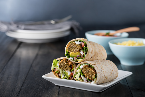 Vegetarian falafel wraps with avocado and cheese