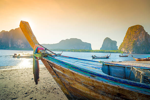 istock Beach and tropical sea with long-tail boat in thailand 526155396