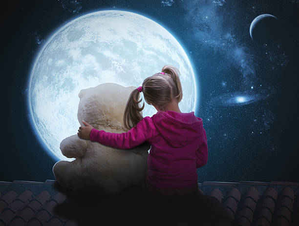 istock Small cute girl sitting with toy bear 526177169
