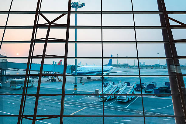 istock window of airport 526178771