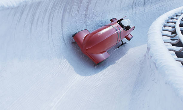 bobsleigh команды - bobsledding стоковые фото и изображения
