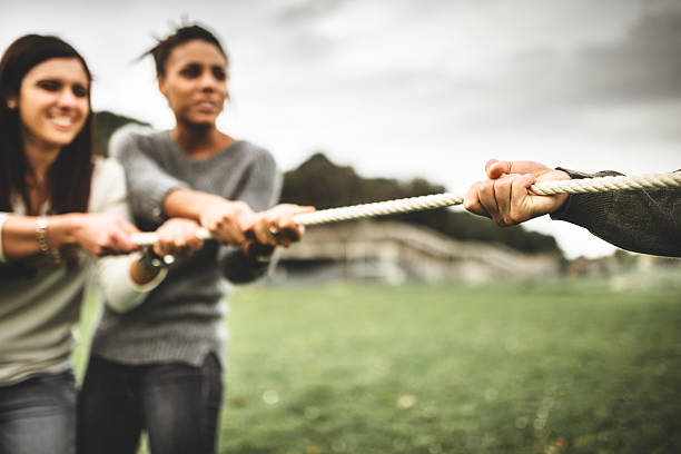 istock Friends doing the Tug of war - teamwork 526181517