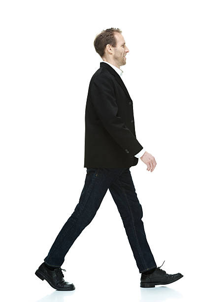 istock Smiling smart casual man walking 526182181