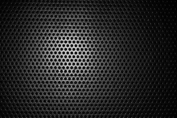 istock Black speaker lattice background, close-up 526193681