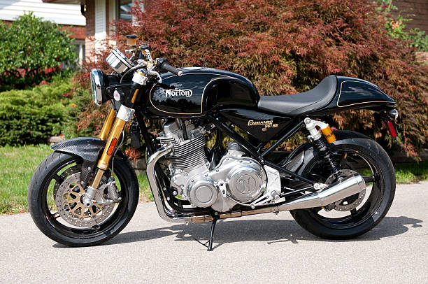 Norton Commando 961 SE #112 Fonthill, Ontario, Canada - August 15, 2014: A rare 2014 Norton Commando 961 Special Edition #112 of 200 bike in the world poses in a driveway in Fonthill, Ontario Canada norton brand name stock pictures, royalty-free photos & images