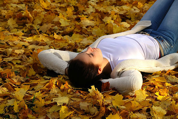 istock Woman sleeping in nature 526198535