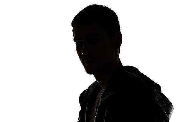 istock Photo of man's silhouette - looking at camera 526209121