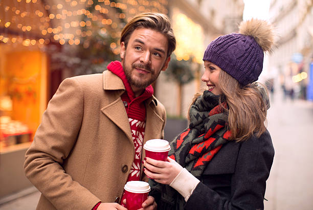istock Couple outdoors in winter city. 526209351