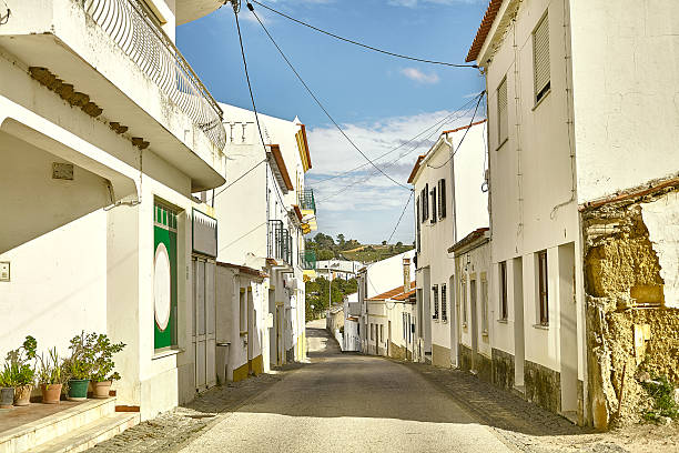 istock Empty street road in city with buildings 526209355