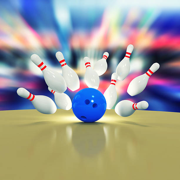 istock Scattered skittles and bowling ball 526214965