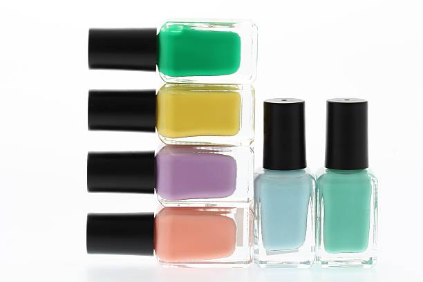 istock Nail polish bottles on white background 526215731