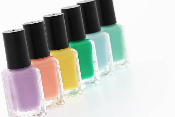 istock Nail polish bottles on white background 526215739